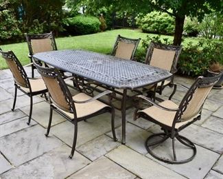 Cast aluminum patio table with 6 chairs