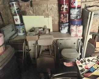 2 sets of 4 folding chairs, desk, misc tins, trash cans, handicapped seat/toilet, ,etc