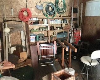 lawn chairs, home made saw horses, misc shop chairs, extension cords, hose extensions, gutter guard, misc tools