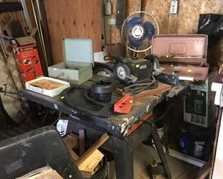 Table saw, grinder, fan and lots of misc in 2 bay garage 