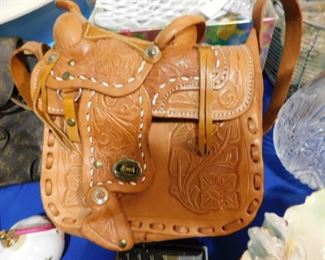 Hand tooled leather saddle purse