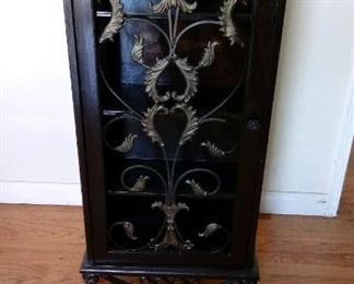 Antique-style case, with metal filigree accents. $200