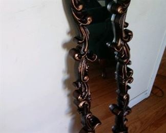 Burnished-bronze look mirror. $35
