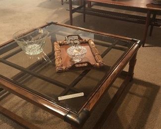 have this wood -glass -brass square coffee table and 2 side tables  along with that  mid century bad boy right behind it.  - big time rare find on that one:))