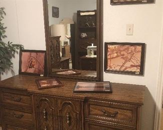 have triple dresser and mirror. -matching queen bed-chest of drawers and night stands 