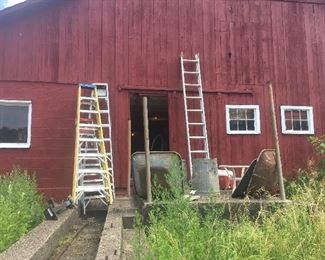 Many Ladders and wheel barrels.