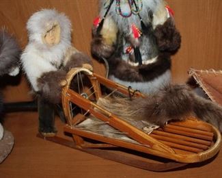 INDOOR, WING 1,  First Room on Left, Made by Fannie Cleveland in Quinhagak; Diamond Willow face with rabbit parka, beaver trimming, and seal skin boots 