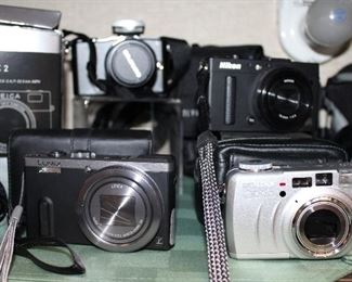 INDOOR, WING 2, First room on Right, Panasonic Lumix DMCZS40 $95/Pentax Optio $28/Olympus Pen mini EPM1 $48/Nikon Coolpix A $195