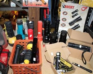 OUTDOOR, GARAGE BAY 1 & 2, High end flashlights including Wizard, Olight, Malent, Sunwayman, Brite Strike, Ranging from $2-$85