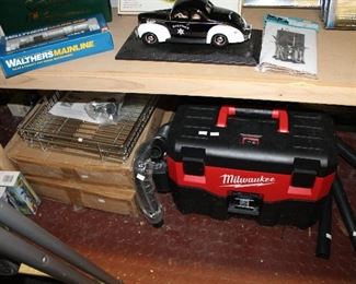 OUTDOOR SHOWROOM, STAND ALONE GARAGE, Milwaukee wet/dry vac $65/Stainless steel extendable shelves