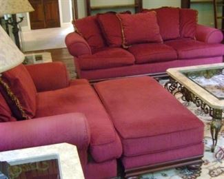 3 - piece Bernhardt sofa, love seat and ottoman finished in thick red upholstery with solid wood trims.