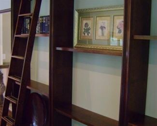 There are 3 sections each measuring about 45 inches wide and over 12 inches deep.  Rolling wooden and brass ladder is about 7 feet tall.  Unit comes with many more shelves that can be placed in any number of positions.