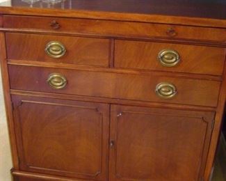 Small side antique Drexel server with 3 drawers and 2 cabinet doors.  Measures 36 inches wide by 33 tall and 18 inches deep.
