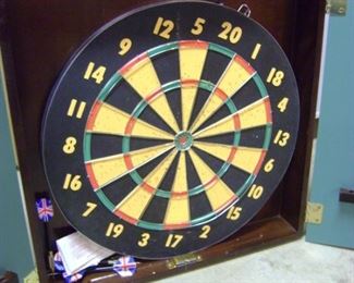 Dart board  with darts in hinged wooden case.