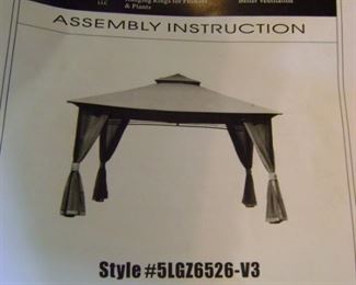 13 foot by 10 foot roof style back yard canopy gazebo.  Almost brand new!