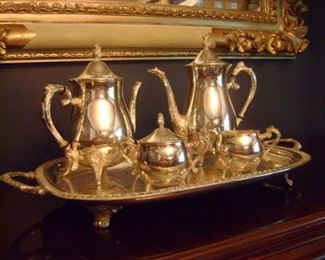 Sterling silver plated coffee/tea with sugar and creamer on beautiful tray.