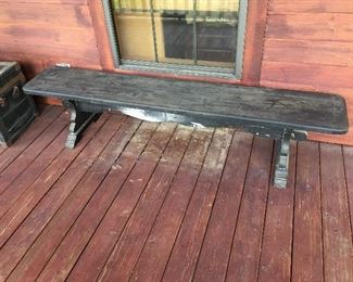 one of two Long black benches 