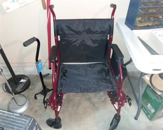 Light weight folding wheel chair in excellent condition 