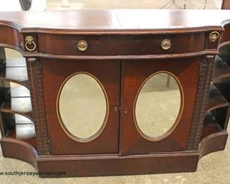 Mahogany Leather Top Oval Mirrored Door One Drawer 2 Door Credenza
Auction Estimate $100-$300 – Located Inside
