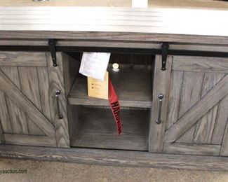 NEW Country Barn Door Front Media Cabinet with Tags in the Grey Wash Finish
Auction Estimate $200-$400 – Located Inside
