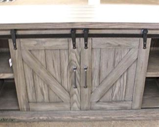NEW Country Barn Door Front Media Cabinet with Tags in the Grey Wash Finish
Auction Estimate $200-$400 – Located Inside
