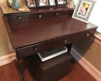  This is a nice old-style desk with stool.
