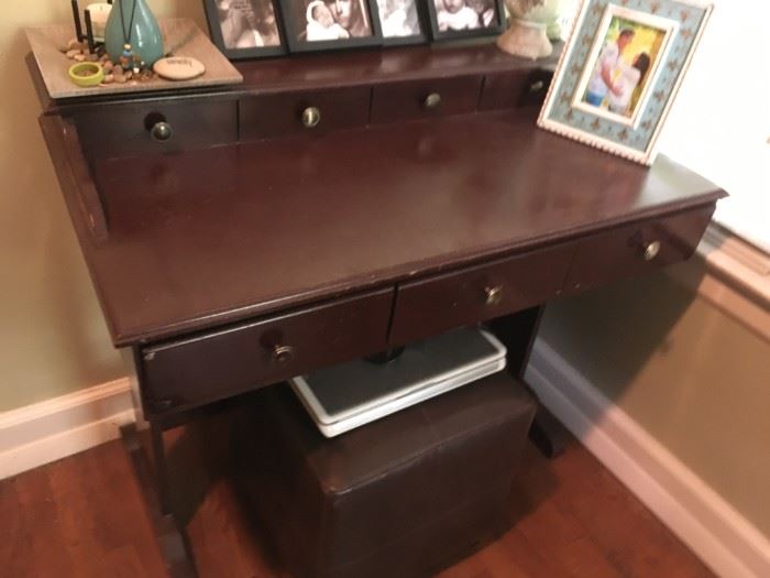  This is a nice old-style desk with stool.