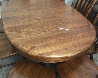 Solid oak dining table and 8 chairs 