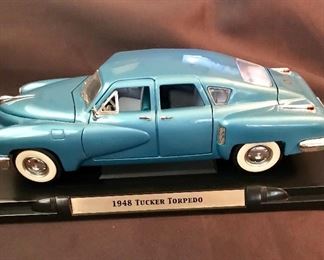 Die cast 1/18 scale "1948 Tucker Torpedo" car. Has moving parts, 11 1/2" long.