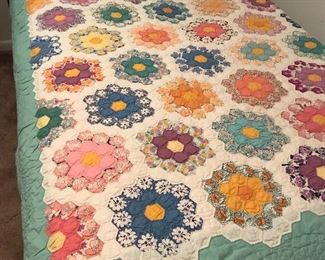 Antique hand sewn quilt, flower garden