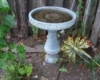concrete bird bath with Greek key design