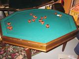 Cool bumper pool table with leather cover for table.
