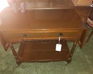 B. Aikin Co. 
Tea cart/ buffet 