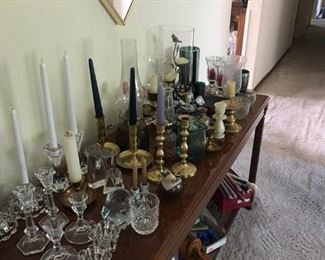 Assorted candle holders and candles