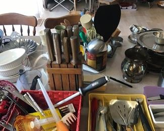 Assorted utensils, knives, serving pieces