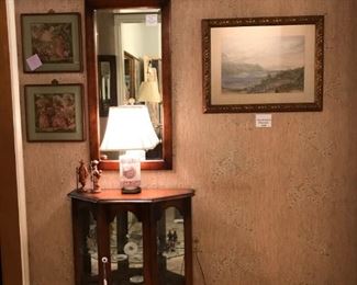 Entryway - lighted curio cabinet with matching mirror.  Small porcelain lamp