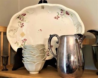 ironstone platters and silver plate pitchers