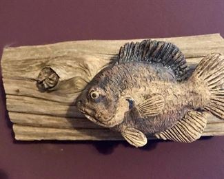 Clay on wood artwork by Tom Glasco