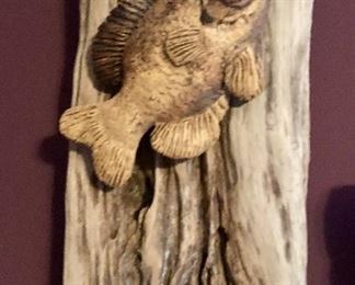 Clay and wood artwork by Tom Glasco