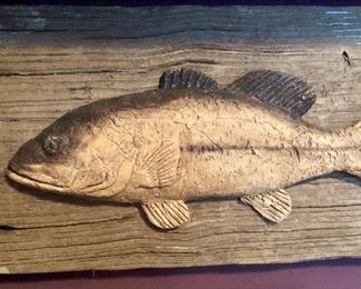 Clay and wood artwork by Tom Glasco