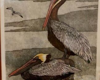 Louisiana artist John Akers 
Hand colored etching “Pelican Perch”  22/200