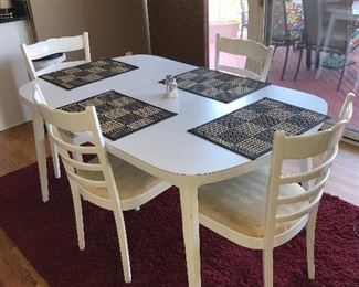 WHITE TABLE W/4 CHAIRS
58” length x 37” width x 29” height