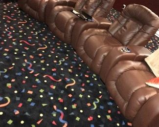 CHOCOLATE BROWN LEATHER THEATER CHAIRS 4 AVAILABLE
RETAIL $1,500 EACH
43” width 40” depth x 40” height