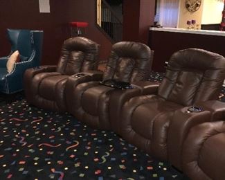 CHOCOLATE BROWN LEATHER THEATER CHAIRS 4 AVAILABLE
RETAIL $1,500 EACH
43” width 40” depth x 40” height