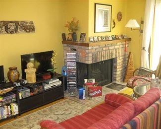 70s rattan sofa and chair, TVs, pottery, tiles, and assorted media