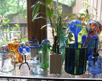 Glass containers and self watering globes