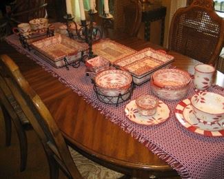 Thomasville dining room table (with 1 leaf) and 4 chairs, decorative dinnerware and serving pieces