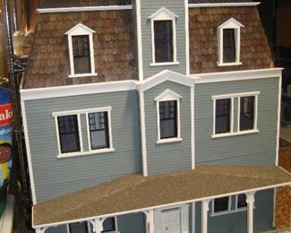 Large, Victorian-style doll house (has furniture)