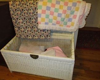 Cute Wicker Trunk with child's linens and misc.
