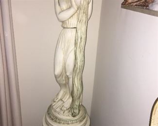 Tall vintage statue on base
